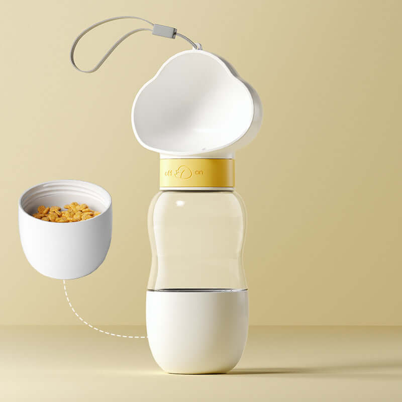 Leak-proof dog water bottle with a built-in food container for pet hydration and feeding.