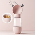 Pink and White ThirstPets portable dog water bottle with food bowl